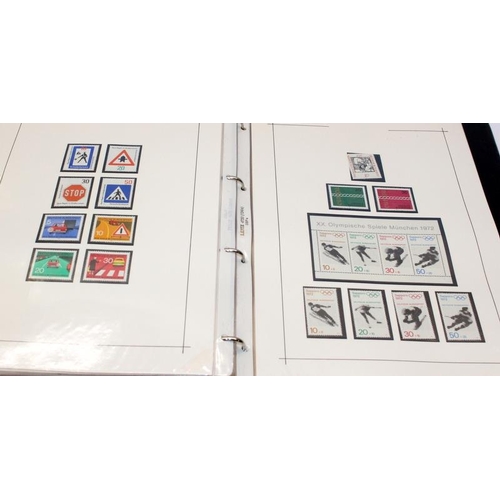 201 - An album of Mid 20thC onwards mint German stamps and stamp sheets c/w a small stock book with a coll... 