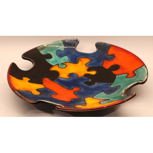 16 - Poole Pottery Jigsaw plate by Nikki Massarella, one off with four cut-outs, thrown by Alan White 15.... 