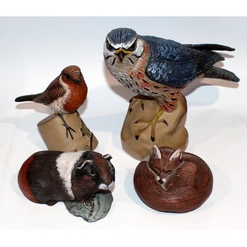 77 - Poole Pottery Acrylic painted Stoneware animals to include large Barred owl (damage to base), Fox pa... 