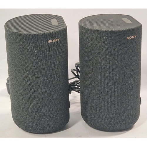 121 - Sony Two Part Active Rear Speaker System SA-RRS5 and SA-LRS5. Both light up when connected to power ... 