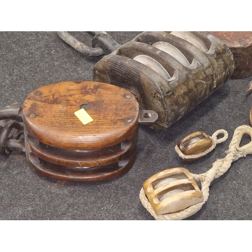 72 - Antique collection of wooden pully blocks, a large Triple, large double , and a large single togethe... 