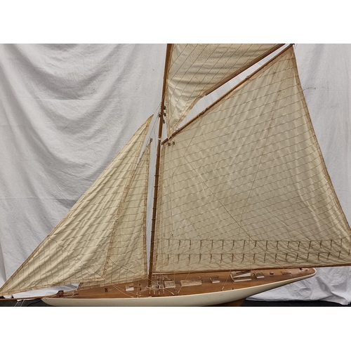 73 - Large Edwardian  wooden Pond yacht, complete with 4 sails and stand fully rigged ,170cm tall includi... 