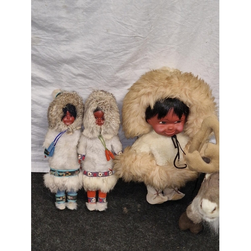 81 - Three 1970's vintage Regal, Canada Eskimo dolls together with two penguin doorstops, a teddy bear an... 