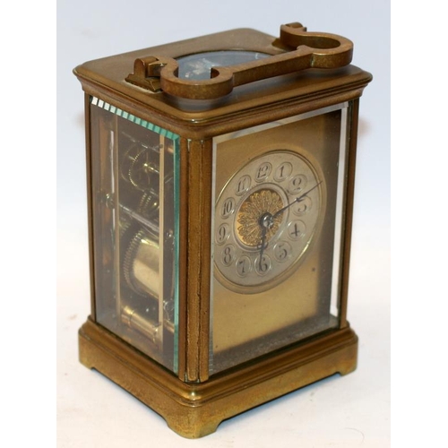 65 - Quality French brass carriage clock with bevelled glass panels. 11.5cms tall. Was working prior to b... 