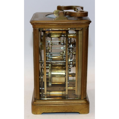 65 - Quality French brass carriage clock with bevelled glass panels. 11.5cms tall. Was working prior to b... 