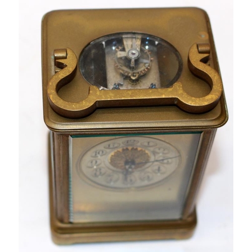 65 - Quality French brass carriage clock with bevelled glass panels. 11.5cms tall. Was working prior to b... 