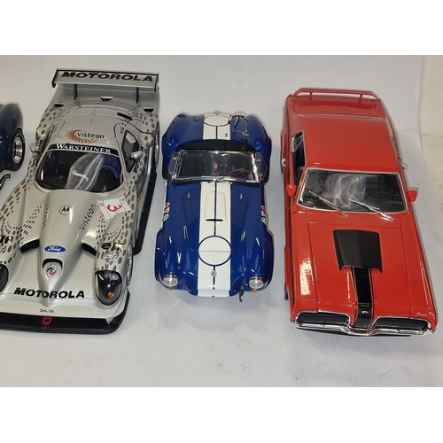 201 - 7 large scale Diecast car models to include hot wheels etc.