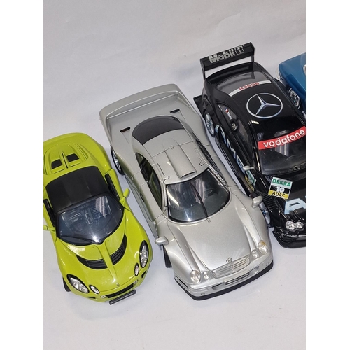 202 - 7 large scale Diecast car models to include Maisto, Burago etc