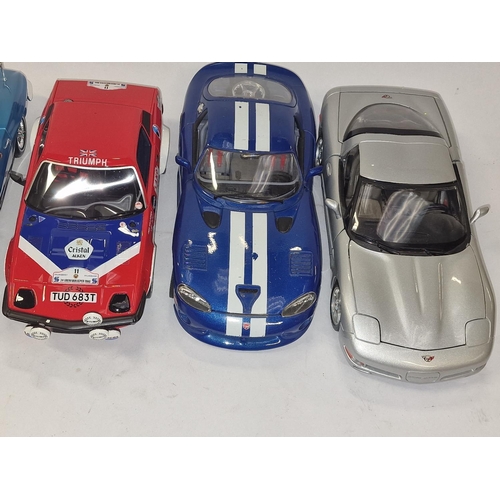 202 - 7 large scale Diecast car models to include Maisto, Burago etc