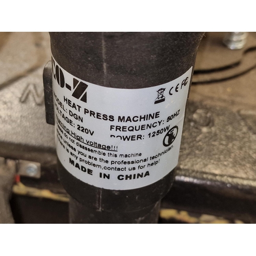 207 - A CO Heat press machine c/w attachments and accessories. Not tested but removed from a working envir... 