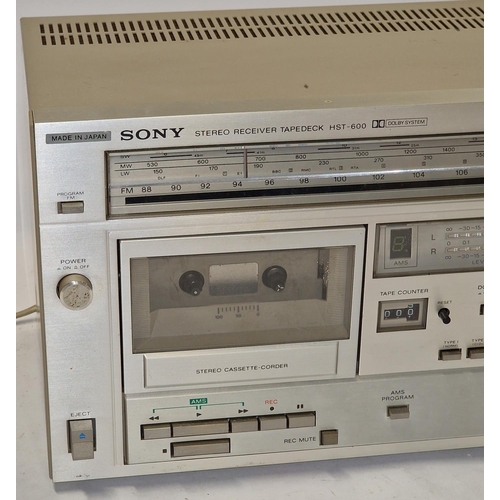 140 - Sony HST-600 Stereo Receiver Tapedeck. Lights up when connected to power but may require a service.