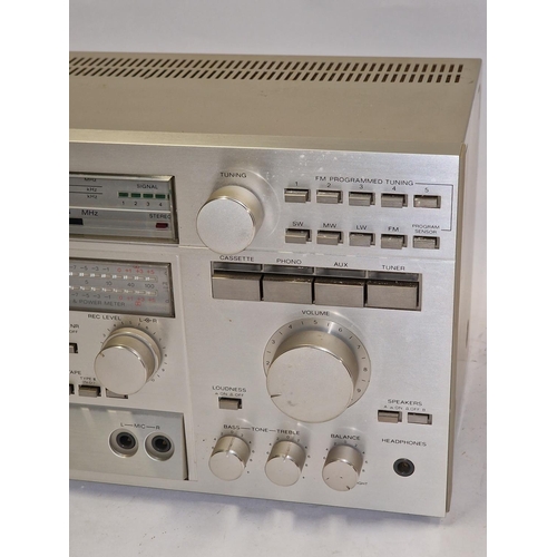 140 - Sony HST-600 Stereo Receiver Tapedeck. Lights up when connected to power but may require a service.