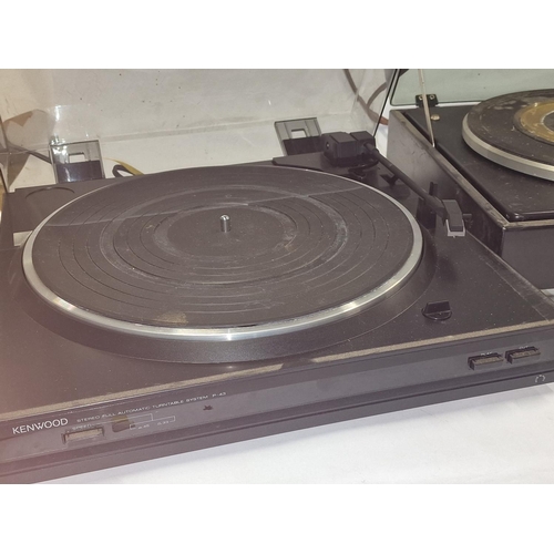 142 - Collection of three turntables to include Kenwood, Garrard and Aiwa. All fitted with cartridges but ... 