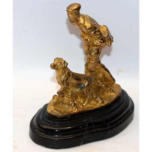 189 - After Mene, gilded cast metal sculpture of a huntsman with his gun dog on a stepped marble base. 21c... 