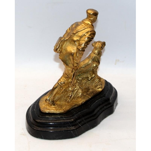 189 - After Mene, gilded cast metal sculpture of a huntsman with his gun dog on a stepped marble base. 21c... 