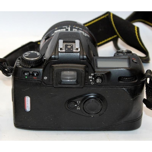 195 - Nikon F80 35mm film SLR camera c/w AF Nikkor 28-105mm zoom lens. Comes in a Lowepro TLZ2 camera bag