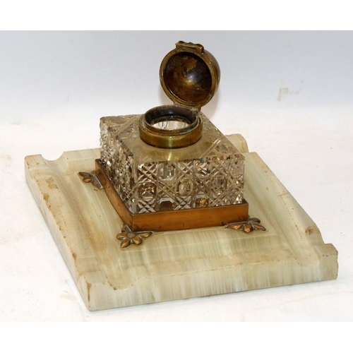 216 - Art Deco cut glass and brass inkwell on an onyx base c/w a mother of pearl card case