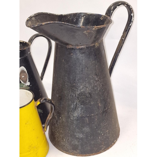 212 - Collection of vintage metal pitchers of varying sizes. Four in total.