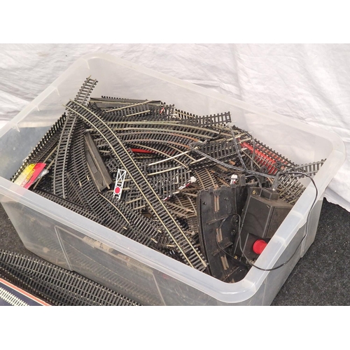 219 - A box containing a large collection of pre owned OO Gauge model railway track to include Hornby.