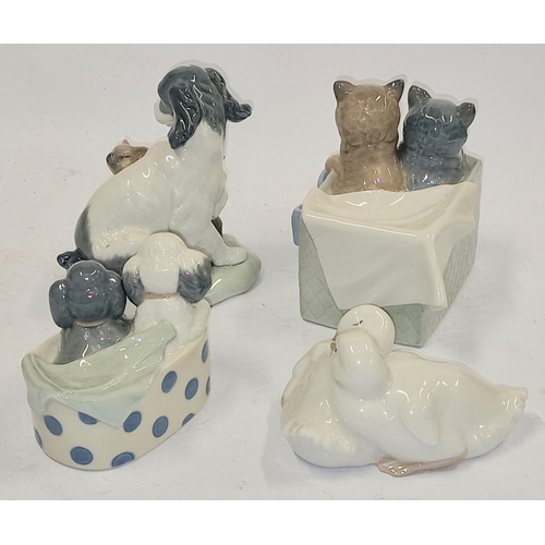 222 - Four Nao porcelain animal figurines.