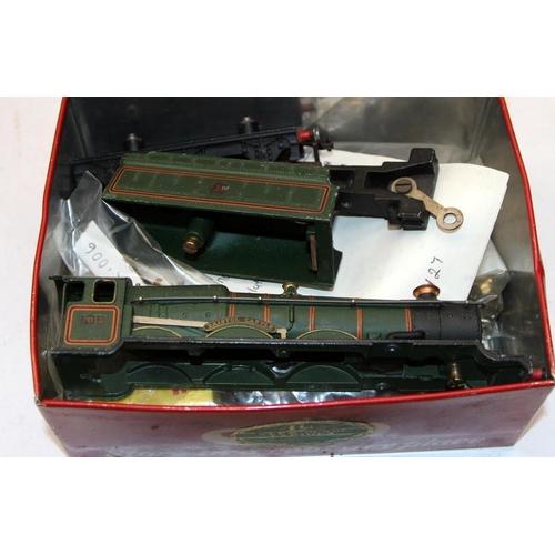 232 - A large quantity of OO gauge trackside buildings and accessories c/w a part built loco project