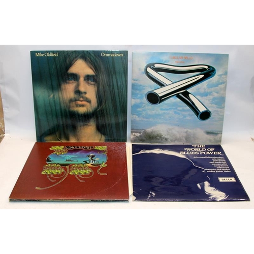 153 - A small selection of Prog/Rock vinyl LP's. Mike Oldfield, Emerson Lake and Palmer, John Mayall, Crea... 