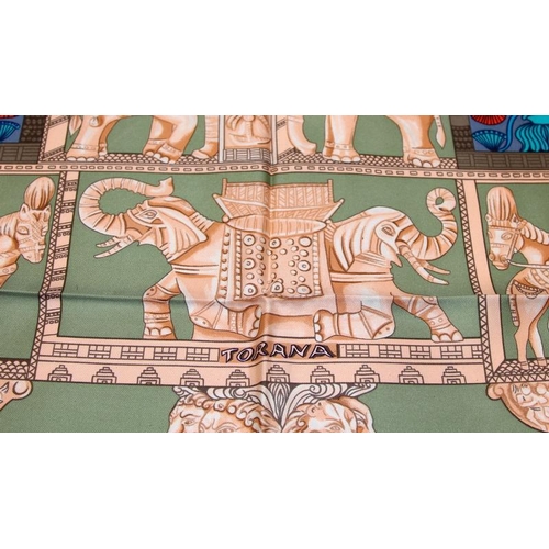 243 - Hermes 'Torana' silk scarf, designed in 1987 by Annie Faivre. Indian Torana design with turquoise bo... 