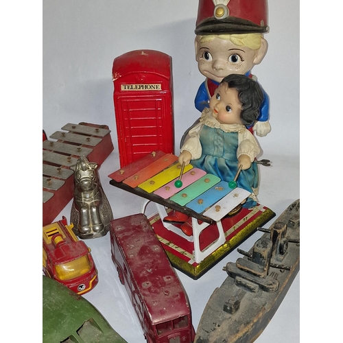 264 - Mixed lot to include vintage toys, Jolly Caribbean man money box, florist's sprayer and other items.