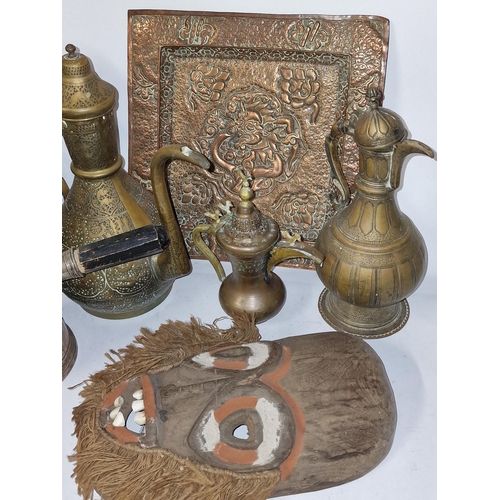 279 - Quantity of mixed Islamic inspired brass and other metalware together with a vintage wooden mask.