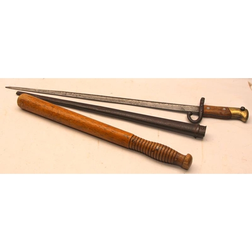 248 - A 19th Century french bayonet c/w an antique wooden nightstick/baton