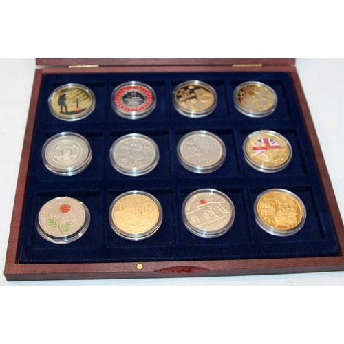 252 - A collection of commemorative coin sets relating to WWI and WWII, colourised and gold plated coins f... 