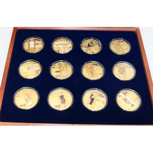 252 - A collection of commemorative coin sets relating to WWI and WWII, colourised and gold plated coins f... 