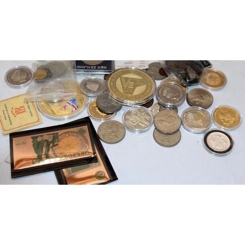 253 - Large quantity of commemorative coins from around the world celebrating royal and historical events,... 