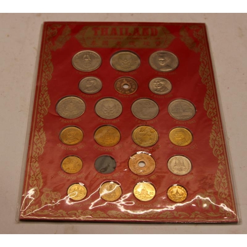 254 - Three presentation cases containing commemorative coins from around the world. Royal and historic ev... 