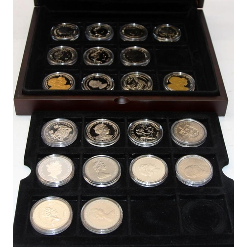 254 - Three presentation cases containing commemorative coins from around the world. Royal and historic ev... 