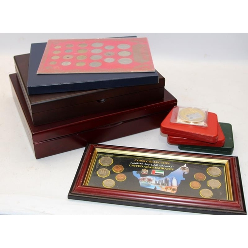 254 - Three presentation cases containing commemorative coins from around the world. Royal and historic ev... 