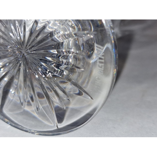 288 - Four pieces of Waterford Crystal to include a bowl, a vase, and two vintage glasses