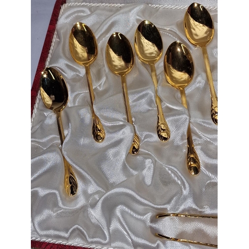 296 - Fitted case of gold plated spoons by 