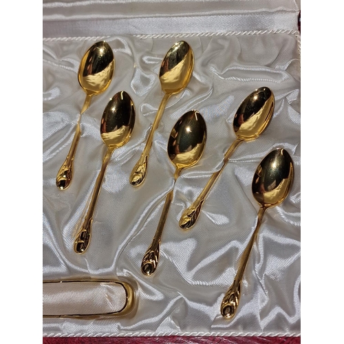 296 - Fitted case of gold plated spoons by 