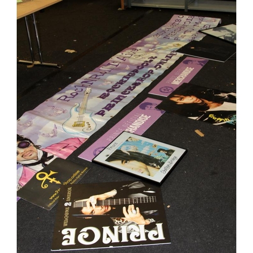 174 - Large collection of Prince music artist memorabilia including framed posters, magazines containing a... 