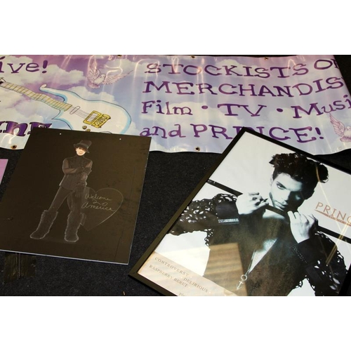 174 - Large collection of Prince music artist memorabilia including framed posters, magazines containing a... 