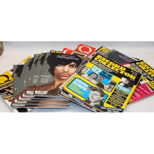 174 - Large collection of Prince music artist memorabilia including framed posters, magazines containing a... 