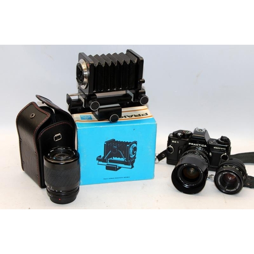 257 - A collection of vintage camera equipment to include a Praktica BC1 Electronic 35mm film SLR camera, ... 