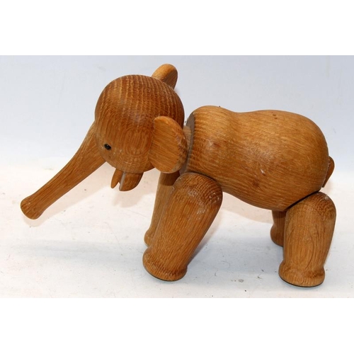 291 - Kay Bojensen - Denmark: Mid Century articulated wooden elephant figure. 24cms across (with trunk ext... 