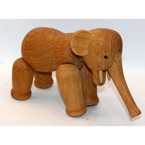 291 - Kay Bojensen - Denmark: Mid Century articulated wooden elephant figure. 24cms across (with trunk ext... 