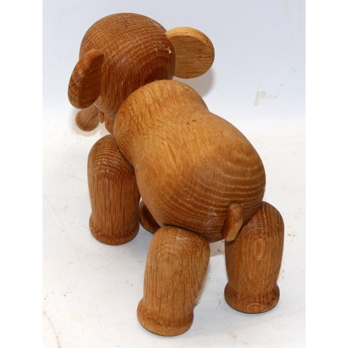 291 - Kay Bojensen - Denmark: Mid Century articulated wooden elephant figure. 24cms across (with trunk ext... 