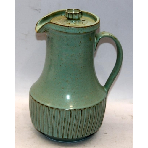 299 - A small collection of Poole Pottery to include a Guy Sydenham designed coffee pot, blue glaze seagul... 