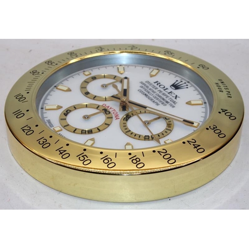 305 - 34cms wall clock with Rolex marked dial. BNIB.