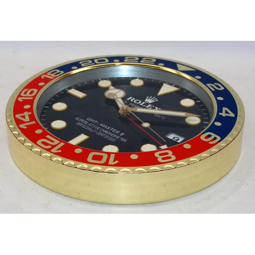 313 - 34cms wall clock with Rolex marked dial. BNIB.