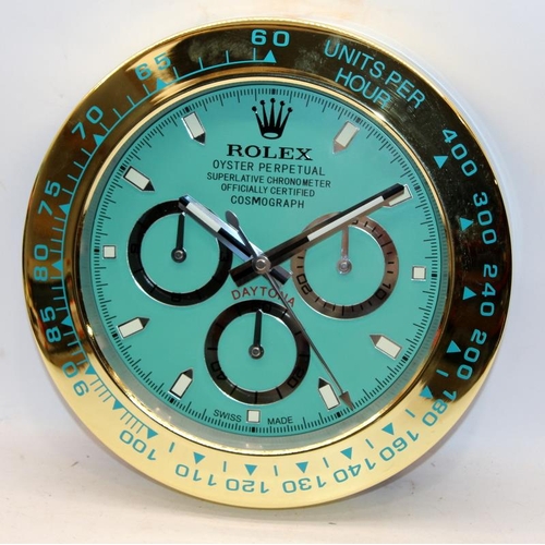 317 - 34cms wall clock with Rolex marked dial. BNIB.